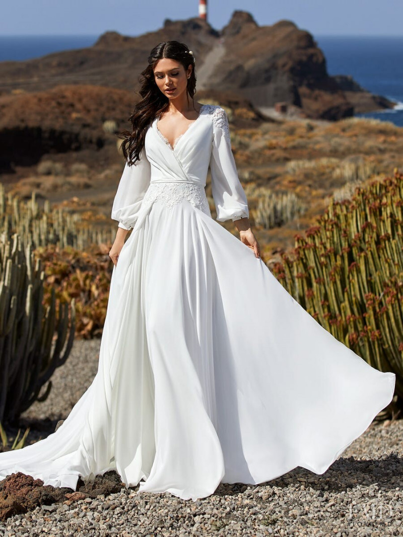 Victoria Bronova featured in  the Pronovias Première Collection II catalogue for Autumn/Winter 2020