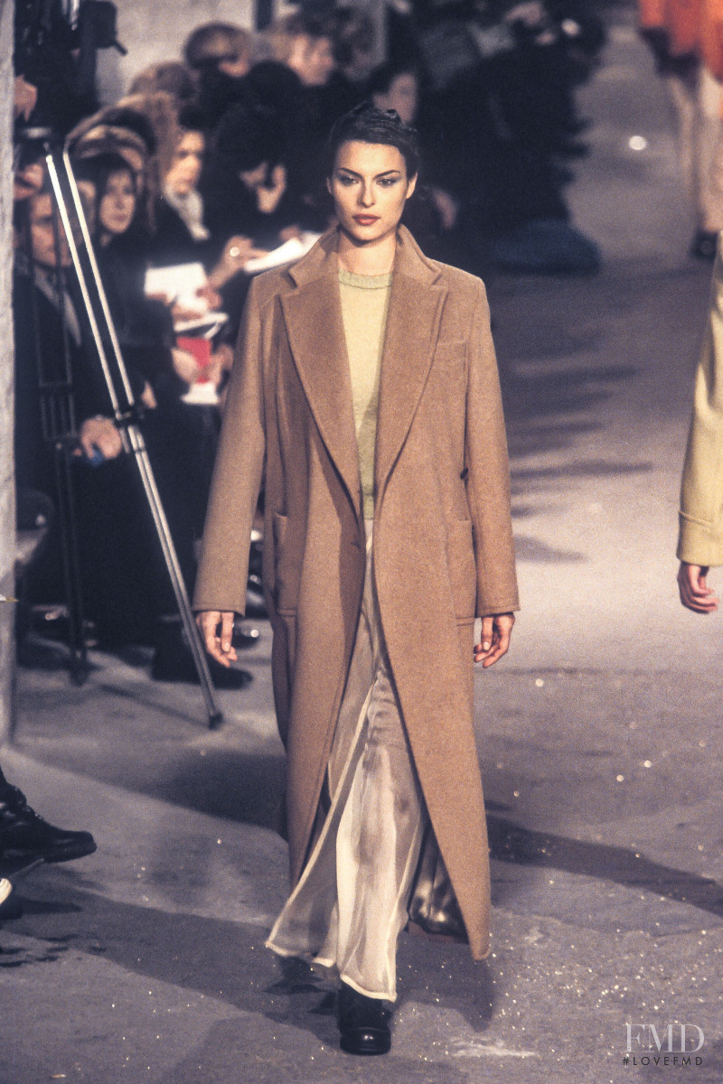 Magali Amadei featured in  the Dries van Noten fashion show for Autumn/Winter 1996