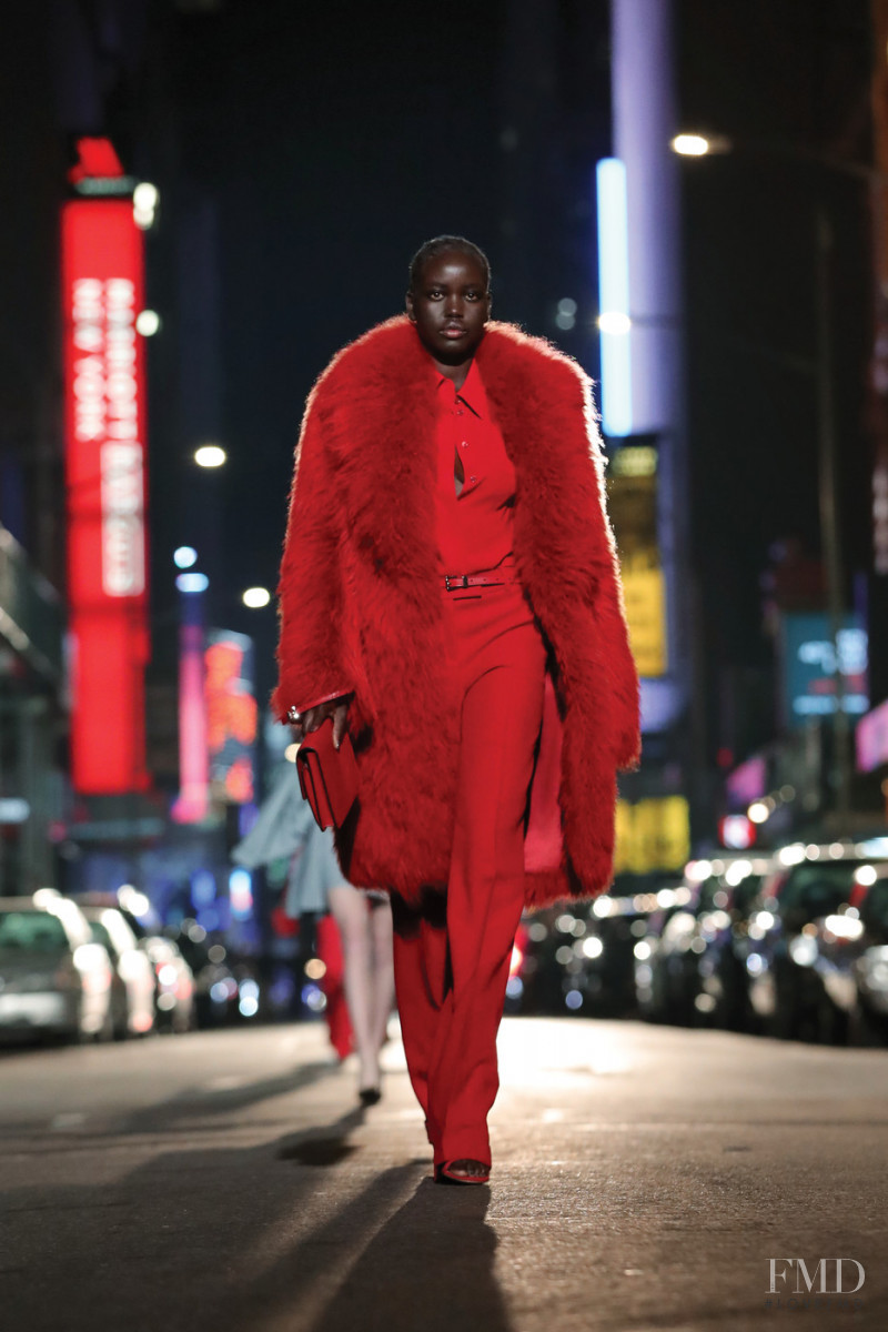 Adut Akech Bior featured in  the Michael Kors Collection fashion show for Autumn/Winter 2021