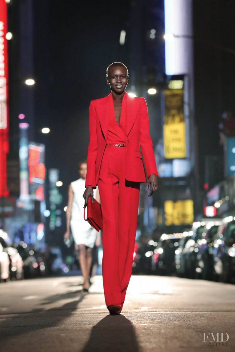 Alek Wek featured in  the Michael Kors Collection fashion show for Autumn/Winter 2021
