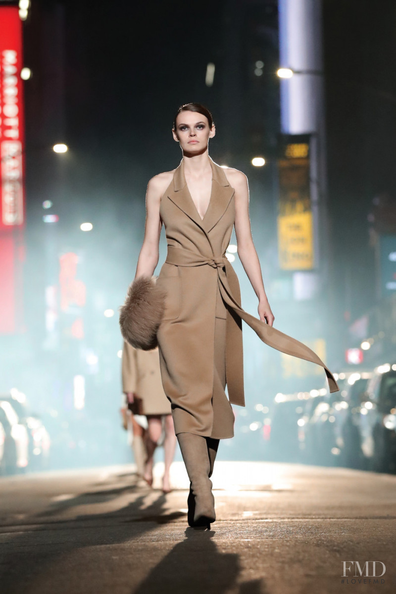 Cara Taylor featured in  the Michael Kors Collection fashion show for Autumn/Winter 2021
