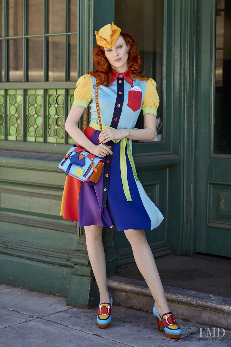 Karen Elson featured in  the Moschino lookbook for Resort 2022