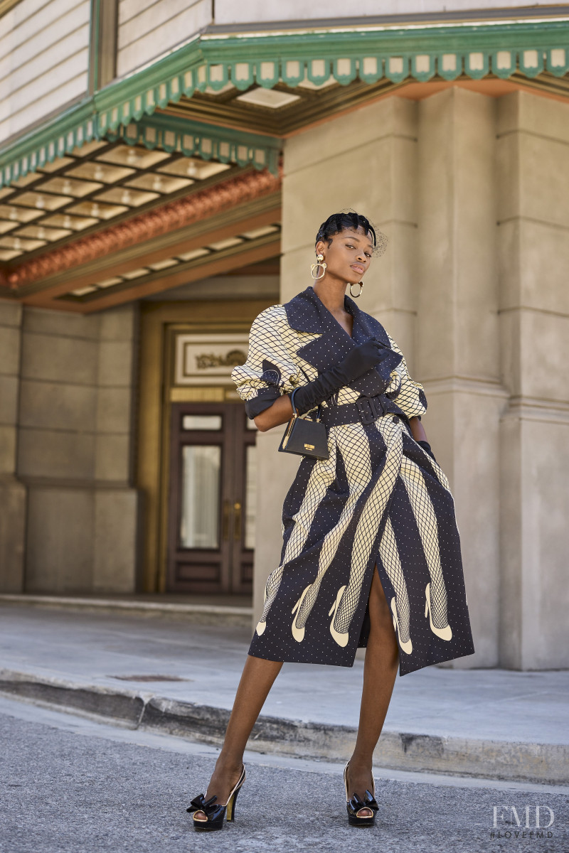 Mayowa Nicholas featured in  the Moschino lookbook for Resort 2022