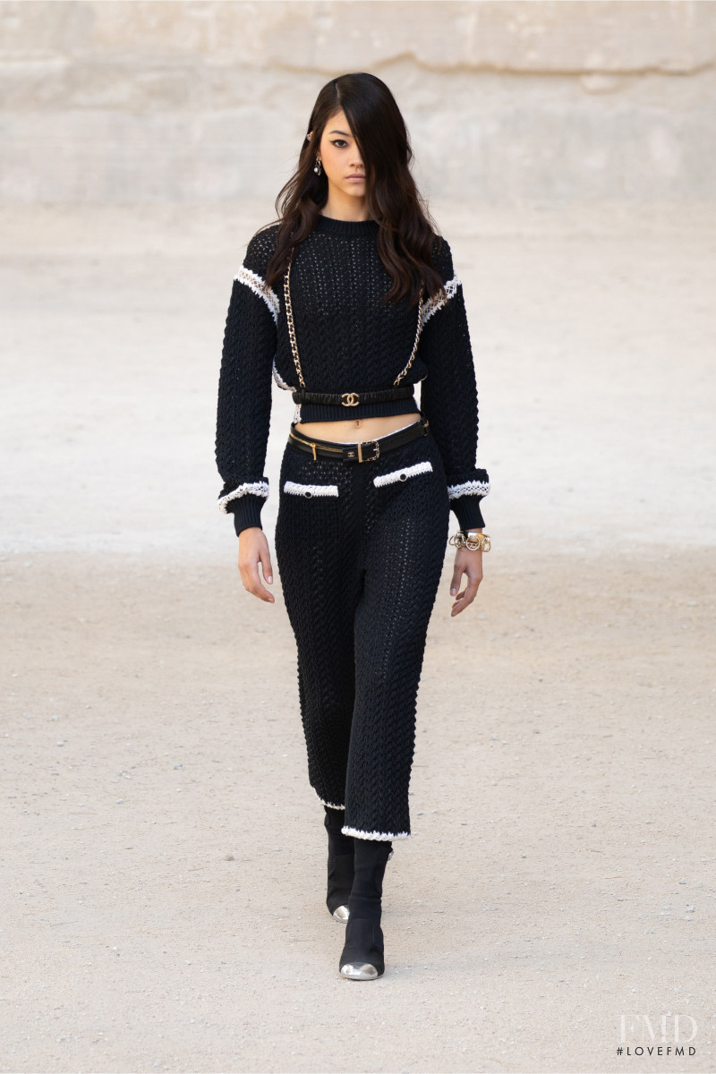 Mika Schneider featured in  the Chanel fashion show for Resort 2022
