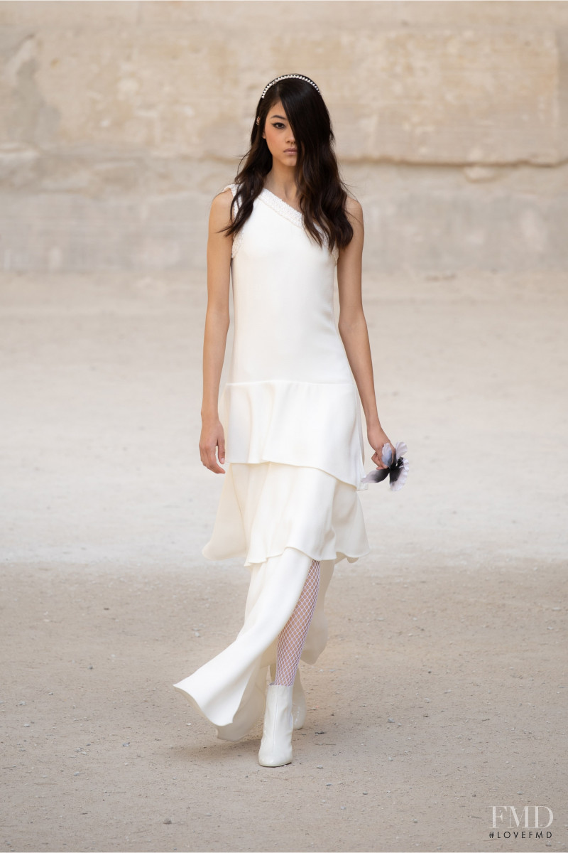 Mika Schneider featured in  the Chanel fashion show for Resort 2022
