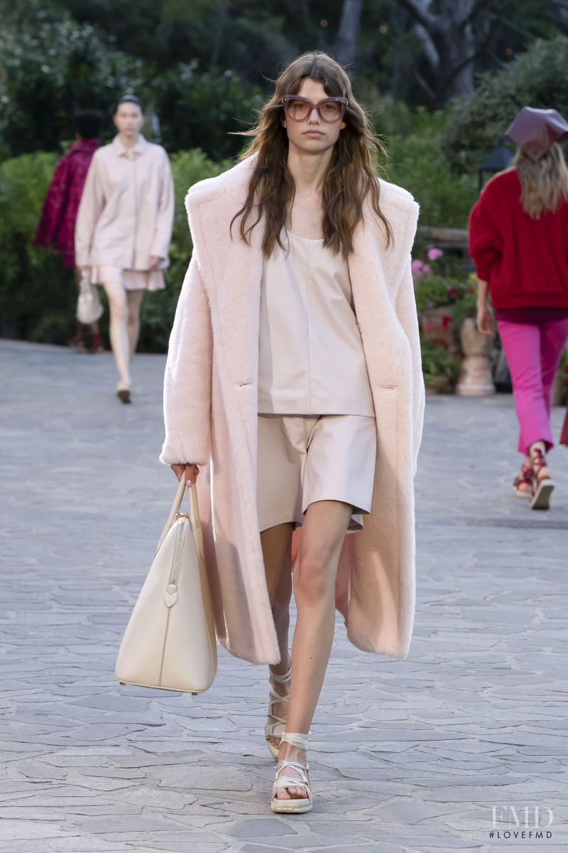 Mathilde Henning featured in  the Max Mara fashion show for Resort 2022