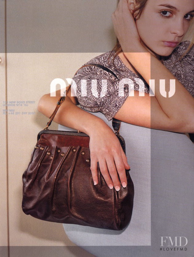 Kristina Chrastekova featured in  the Miu Miu advertisement for Spring/Summer 2002