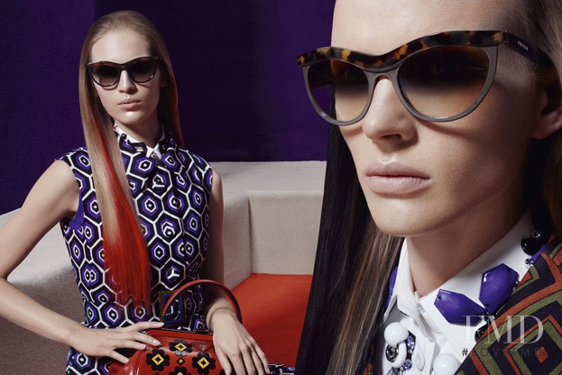 Anne Vyalitsyna featured in  the Prada advertisement for Autumn/Winter 2012