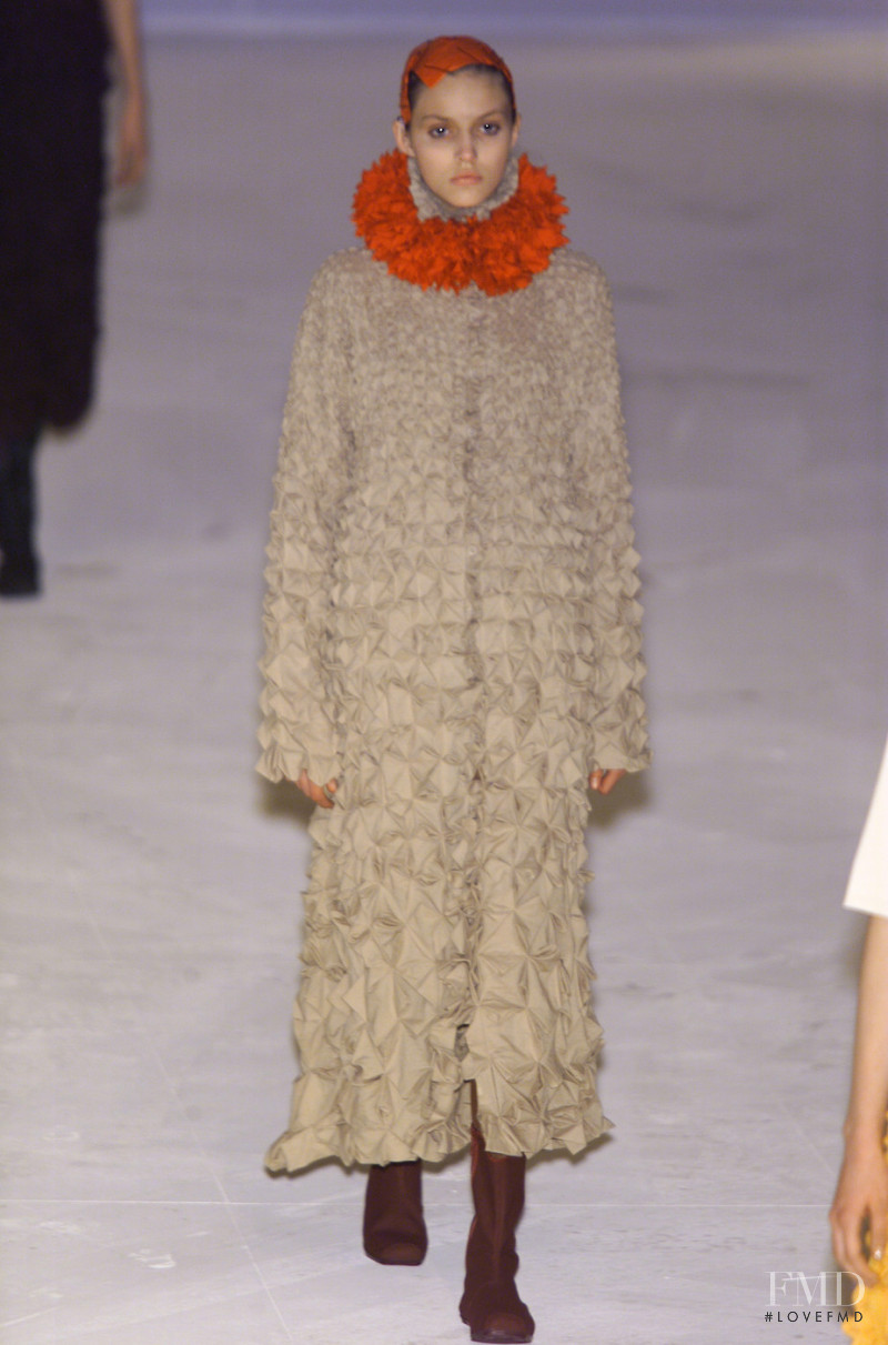 Anja Rubik featured in  the Issey Miyake fashion show for Autumn/Winter 2001