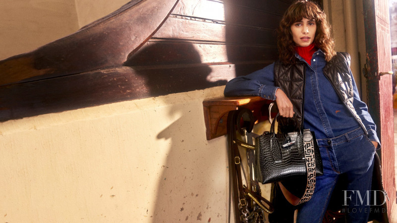 Mica Arganaraz featured in  the Longchamp advertisement for Autumn/Winter 2021