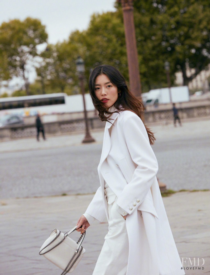 Liu Wen featured in  the Chanel x Amour Paris lookbook for Spring/Summer 2018
