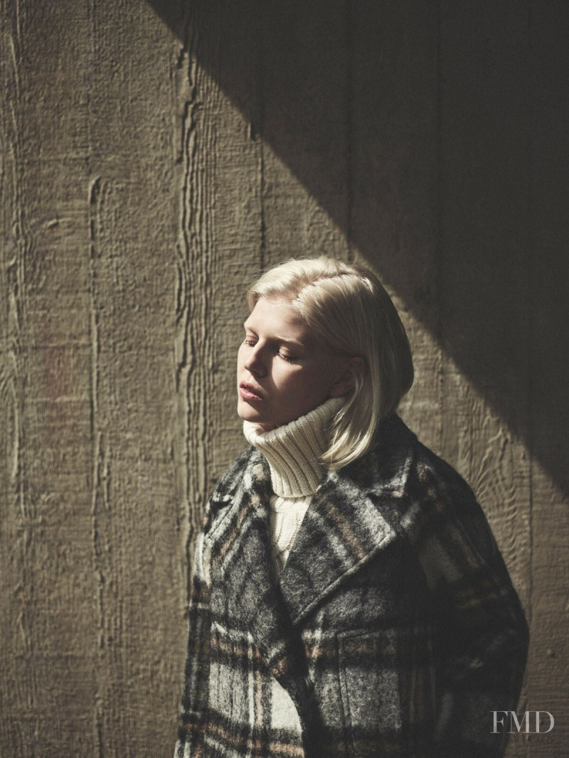 Ola Rudnicka featured in  the Cos Sweden advertisement for Autumn/Winter 2018