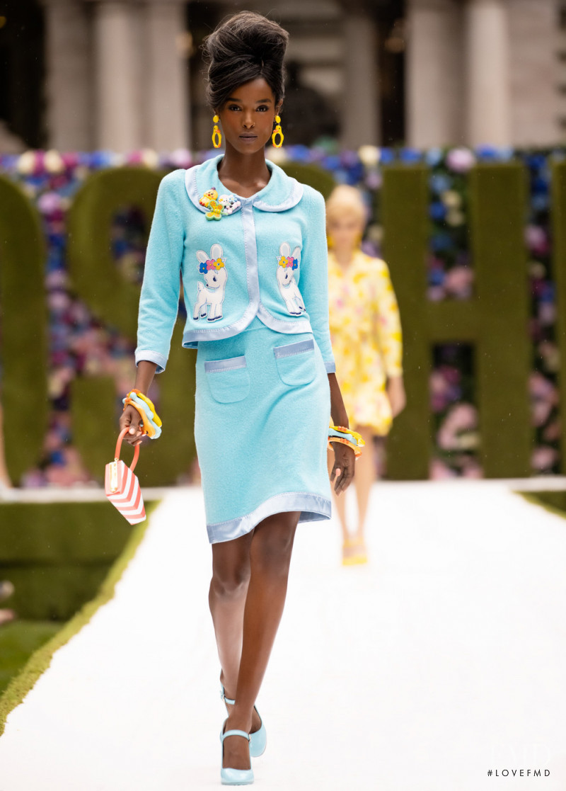 Malika Louback featured in  the Moschino fashion show for Spring/Summer 2022