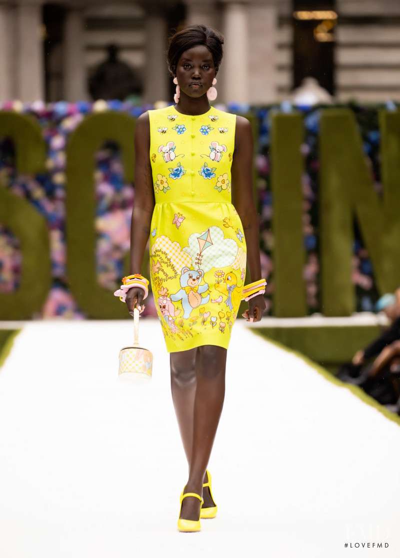 Adut Akech Bior featured in  the Moschino fashion show for Spring/Summer 2022