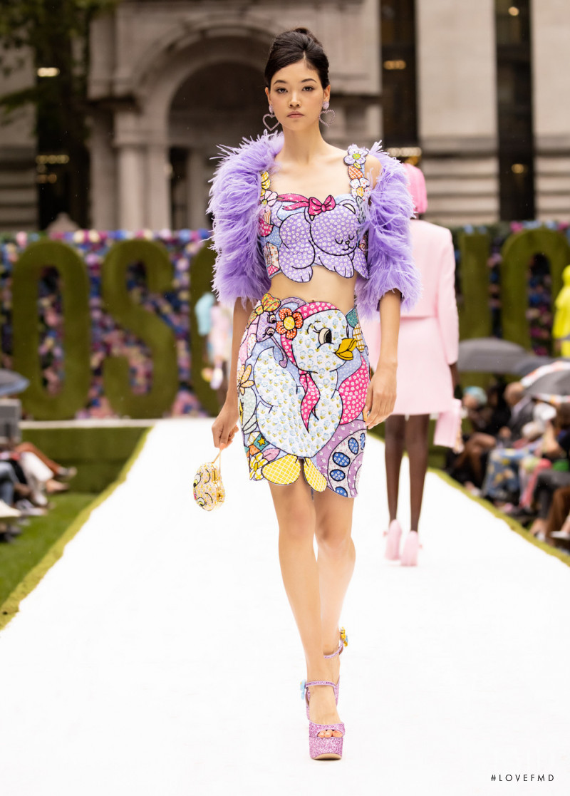 Mika Schneider featured in  the Moschino fashion show for Spring/Summer 2022