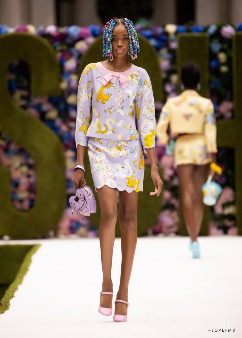 Jadore Benjamin featured in  the Moschino fashion show for Spring/Summer 2022