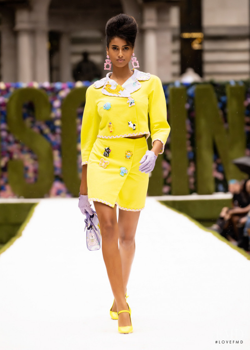Imaan Hammam featured in  the Moschino fashion show for Spring/Summer 2022