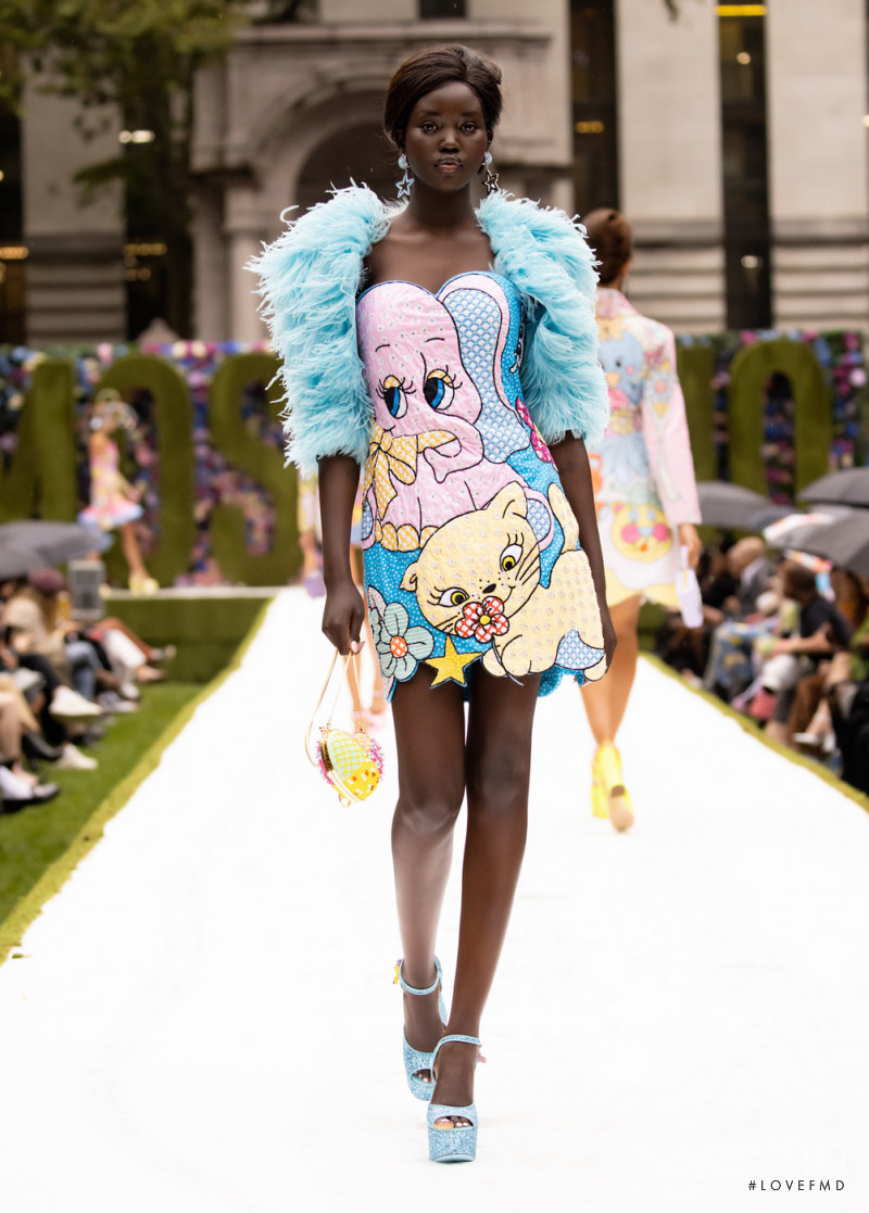 Adut Akech Bior featured in  the Moschino fashion show for Spring/Summer 2022
