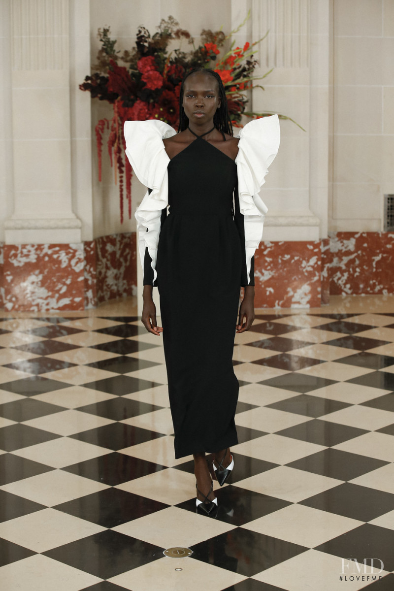 Ajok Madel featured in  the Carolina Herrera fashion show for Spring/Summer 2022