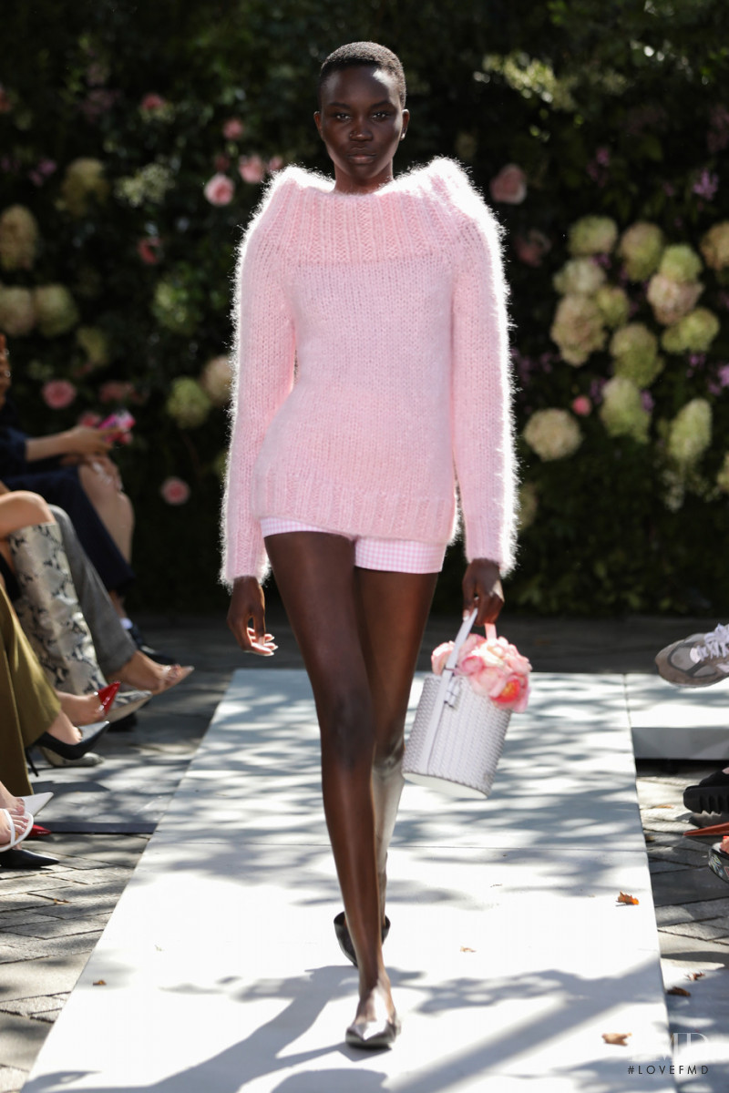 Achenrin Madit featured in  the Michael Kors Collection fashion show for Spring/Summer 2022