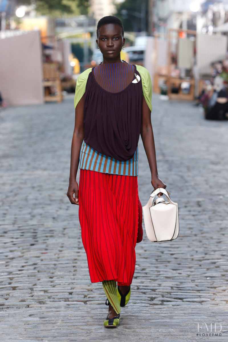 Achenrin Madit featured in  the Tory Burch fashion show for Spring/Summer 2022