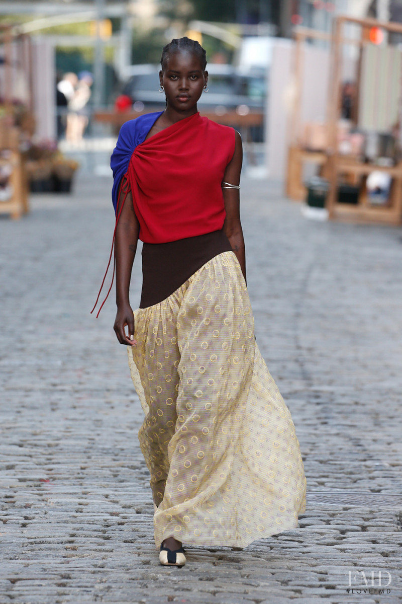 Adut Akech Bior featured in  the Tory Burch fashion show for Spring/Summer 2022