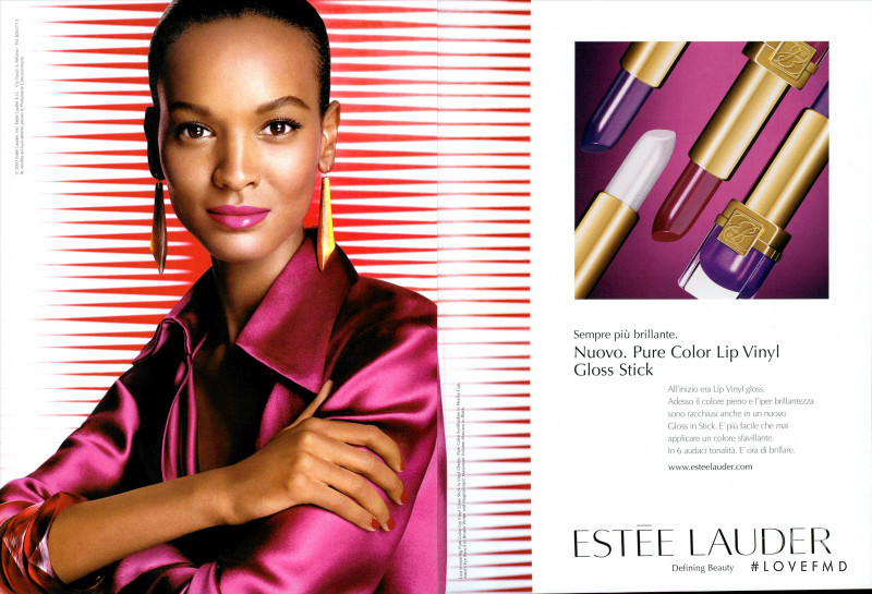 Liya Kebede featured in  the Estée Lauder Pure Color Lip Vinyl Gloss Stick advertisement for Spring/Summer 2003