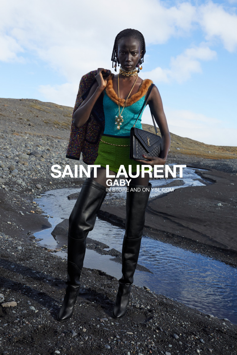 Anok Yai featured in  the Saint Laurent advertisement for Winter 2021