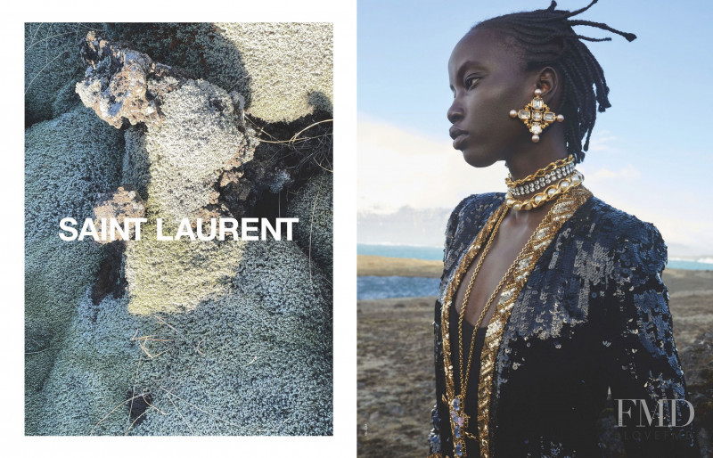 Anok Yai featured in  the Saint Laurent advertisement for Winter 2021
