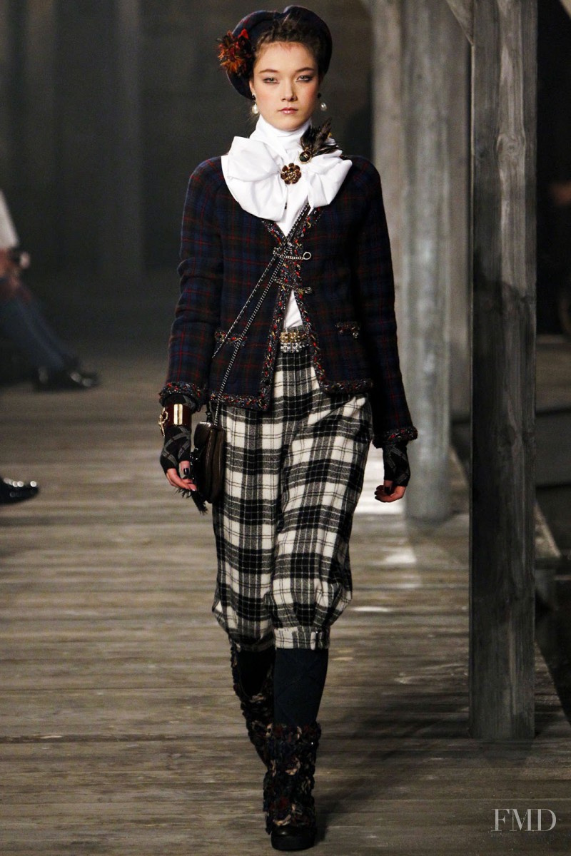 Yumi Lambert featured in  the Chanel fashion show for Pre-Fall 2013