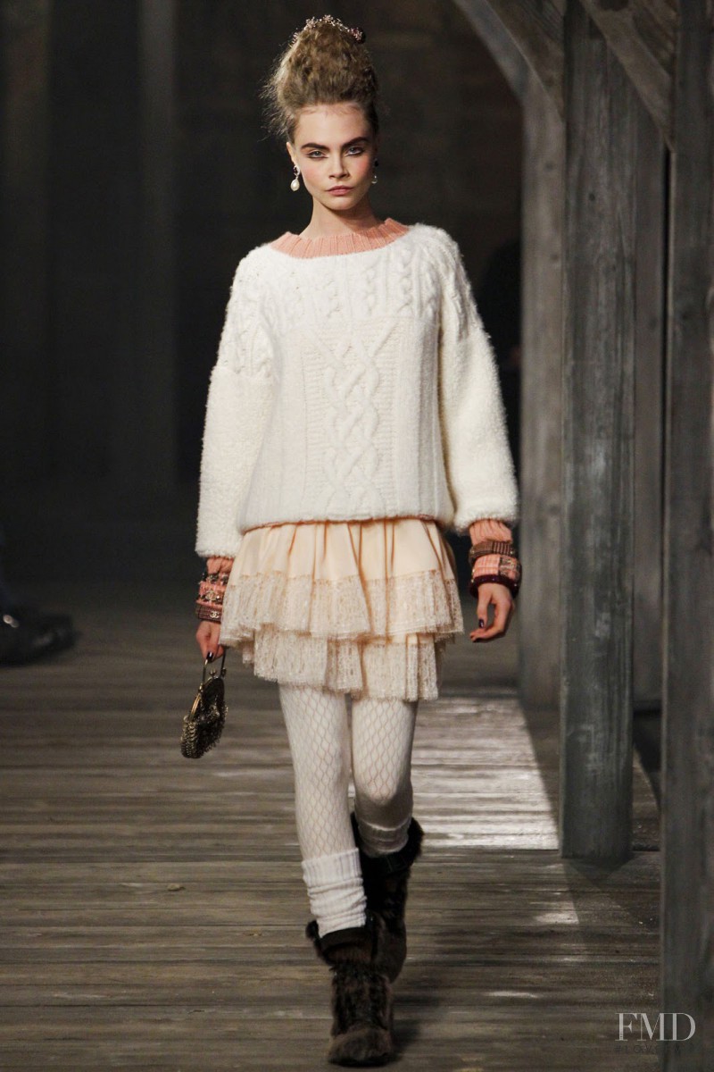 Cara Delevingne featured in  the Chanel fashion show for Pre-Fall 2013