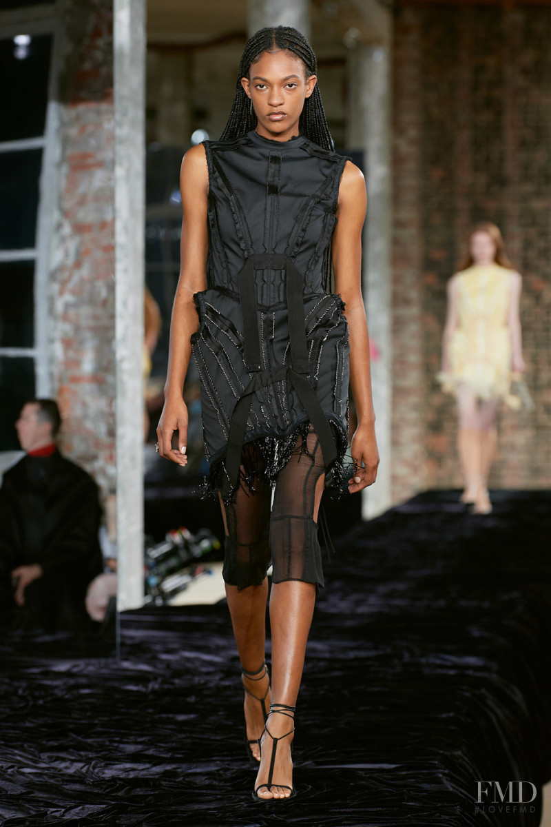Amya Powell featured in  the Acne Studios fashion show for Spring/Summer 2022