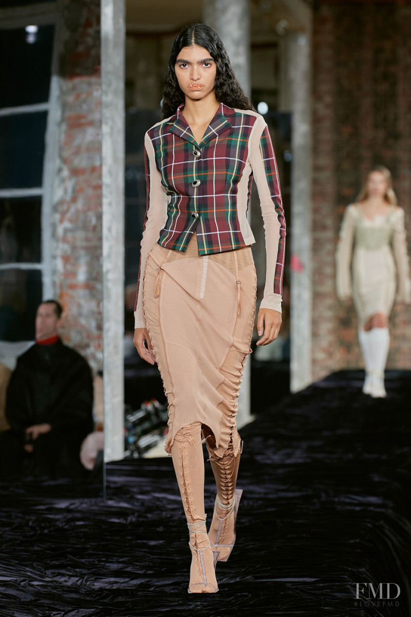 Anita Pozzo featured in  the Acne Studios fashion show for Spring/Summer 2022