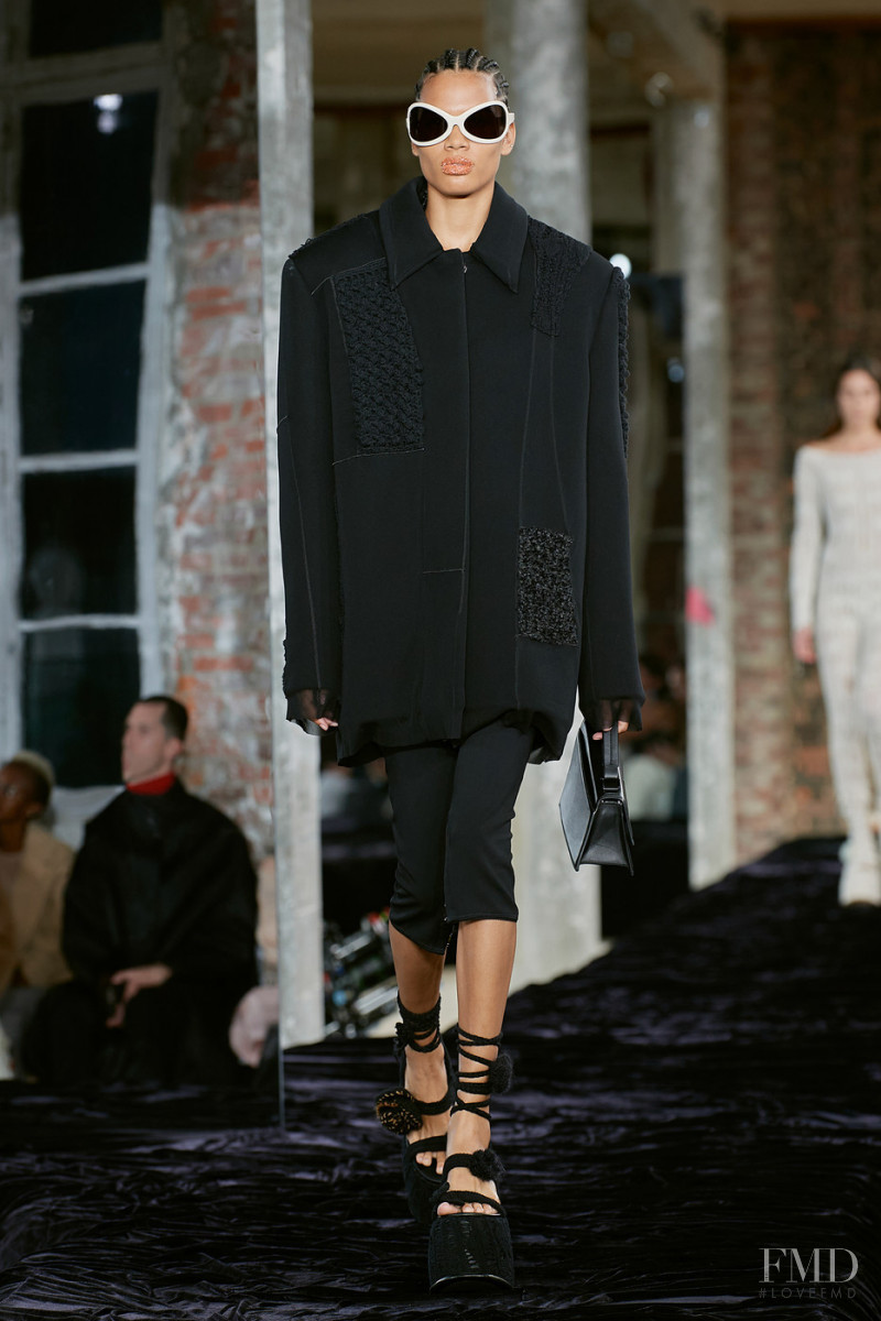 Lina Cruz featured in  the Acne Studios fashion show for Spring/Summer 2022