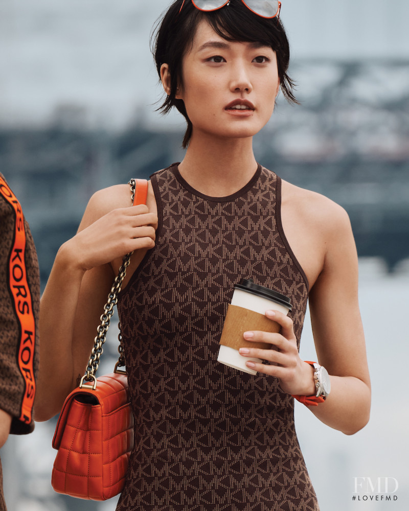 Ashley Foo featured in  the Kors Michael Kors advertisement for Autumn/Winter 2021