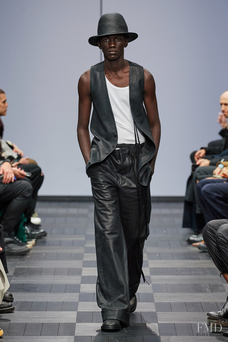 Moustapha Sy featured in  the Ann Demeulemeester fashion show for Spring/Summer 2022