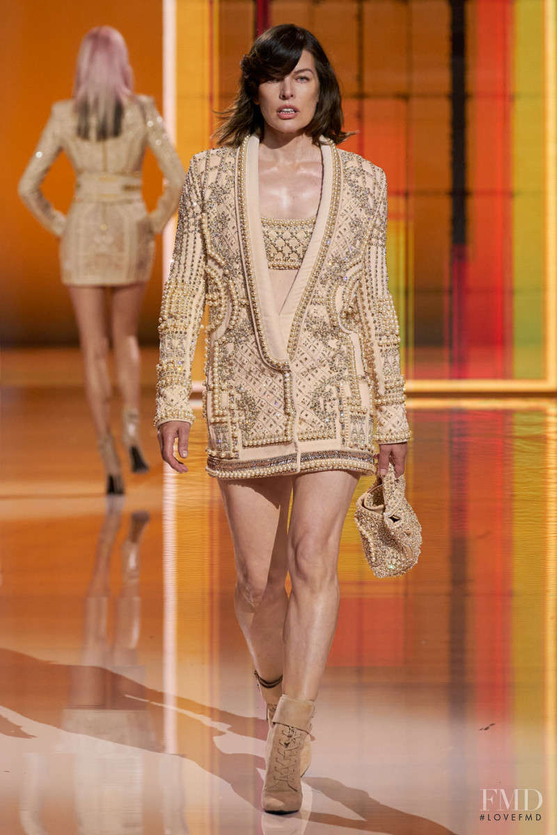 Milla Jovovich featured in  the Balmain fashion show for Spring/Summer 2022