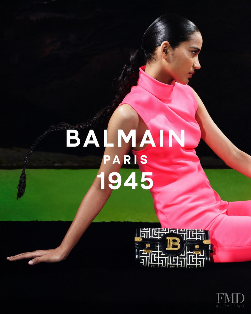 Ame Amrit featured in  the Balmain 1945 Bags advertisement for Spring/Summer 2021