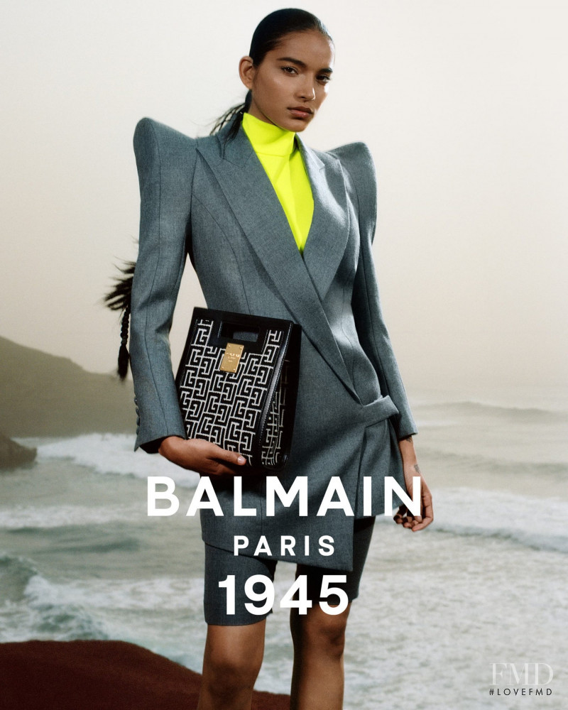 Ame Amrit featured in  the Balmain 1945 Bags advertisement for Spring/Summer 2021