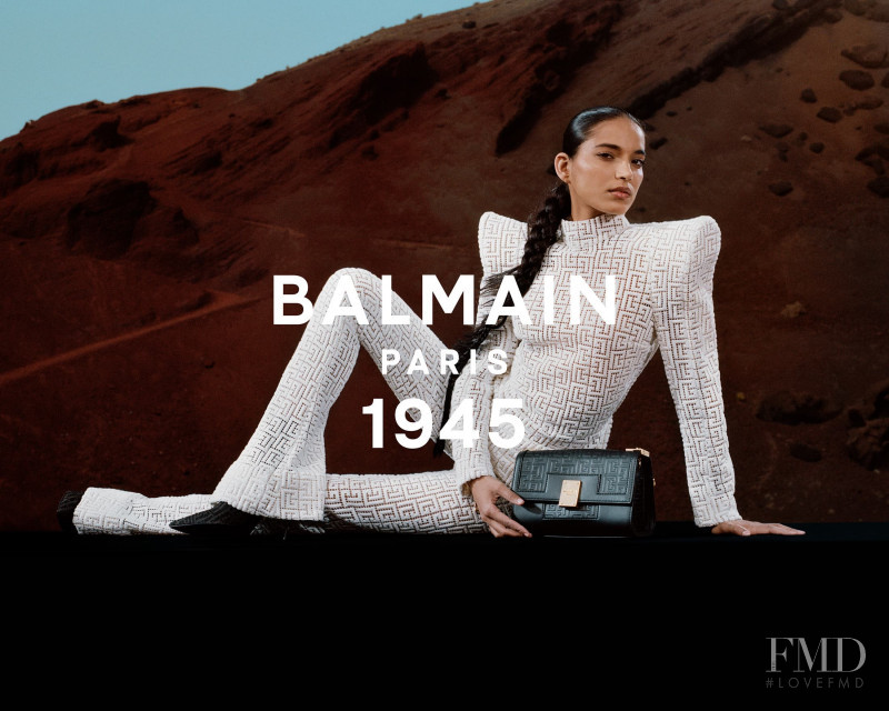 Ame Amrit featured in  the Balmain 1945 Bags advertisement for Spring/Summer 2021