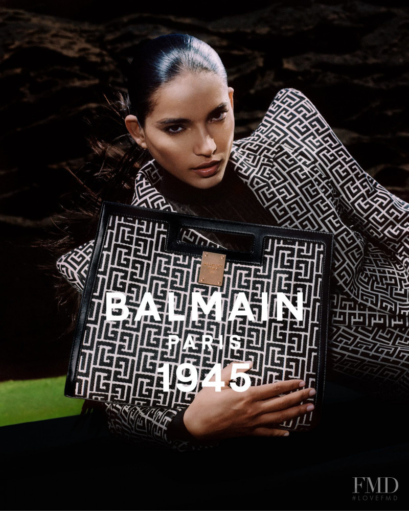 Ame Amrit featured in  the Balmain 1945 Bags advertisement for Spring/Summer 2021