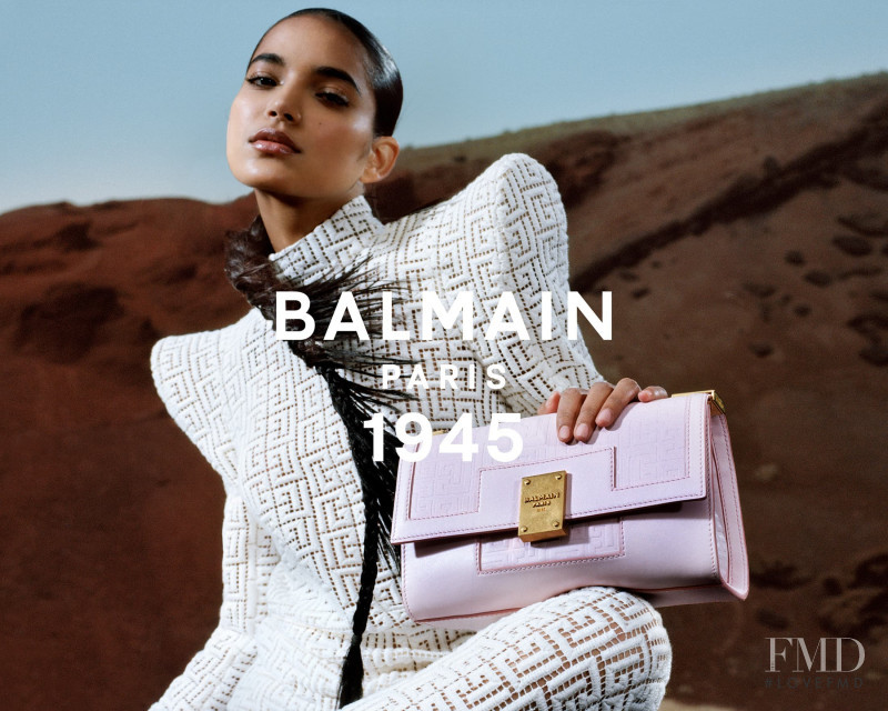 Ame Amrit featured in  the Balmain 1945 Bags advertisement for Spring/Summer 2021