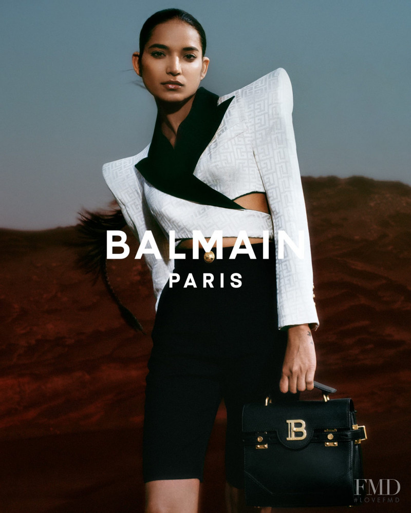 Ame Amrit featured in  the Balmain 1945 Bags advertisement for Spring/Summer 2021