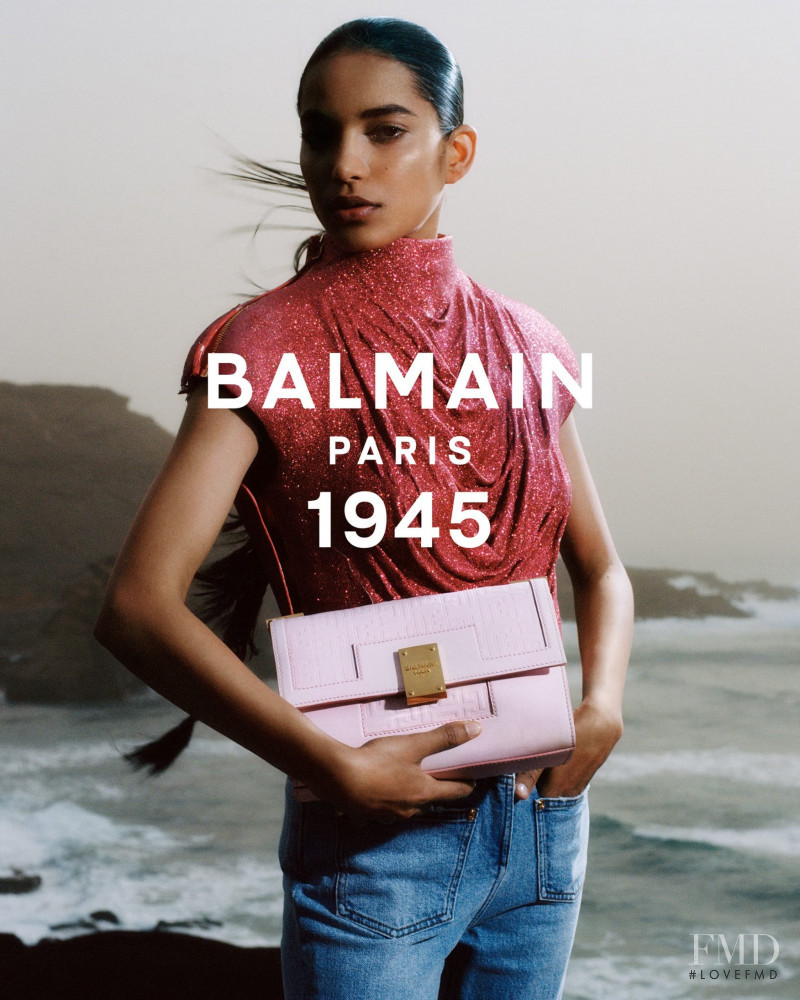 Ame Amrit featured in  the Balmain 1945 Bags advertisement for Spring/Summer 2021