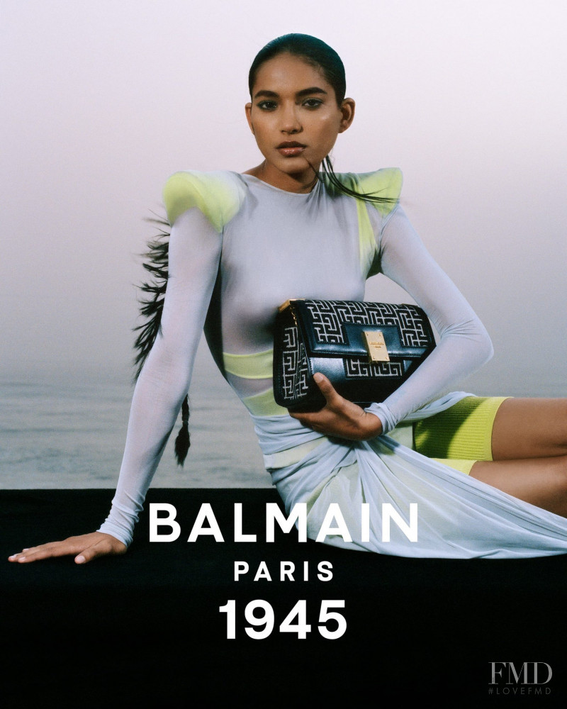 Ame Amrit featured in  the Balmain 1945 Bags advertisement for Spring/Summer 2021