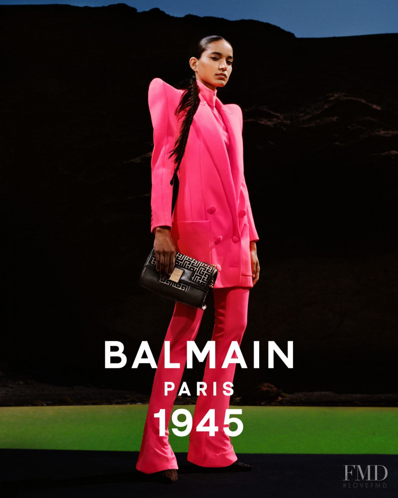 Ame Amrit featured in  the Balmain 1945 Bags advertisement for Spring/Summer 2021