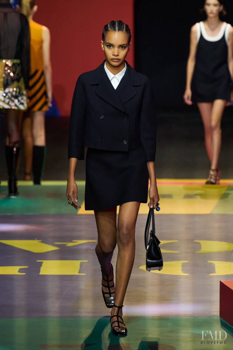 Naomi Ekindi Dioh featured in  the Christian Dior fashion show for Spring/Summer 2022