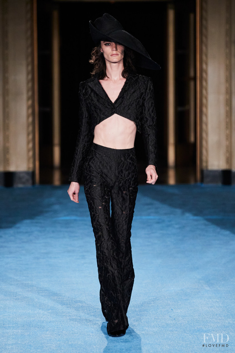 Aleksey Kosyanov featured in  the Christian Siriano fashion show for Spring/Summer 2022