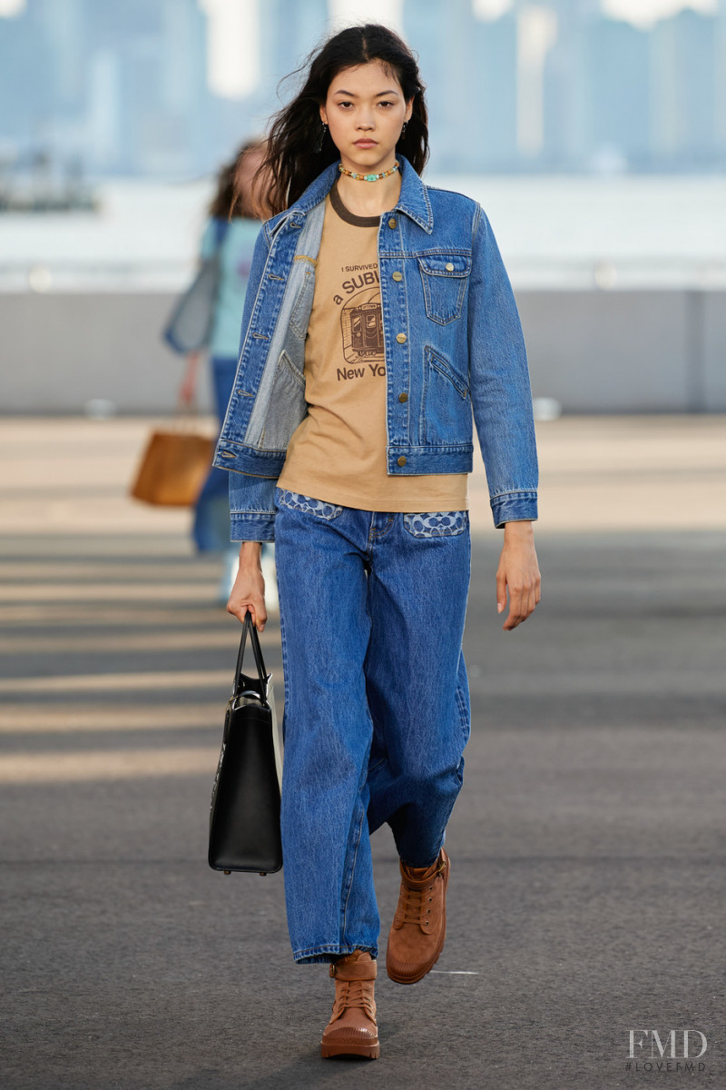 Mika Schneider featured in  the Coach fashion show for Spring/Summer 2022