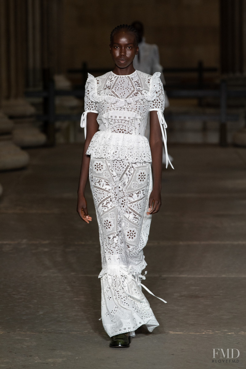 Ajok Madel featured in  the Erdem fashion show for Spring/Summer 2022
